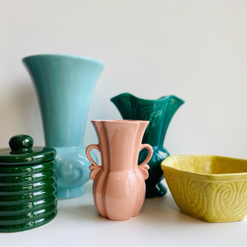 Vintage green vase with art deco leaf patterns